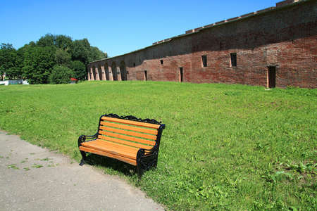 yellow bench in summer parkの写真素材