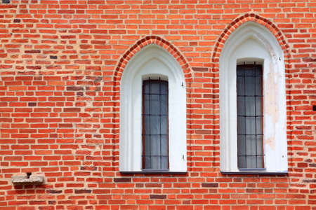 window in red brick wallの写真素材