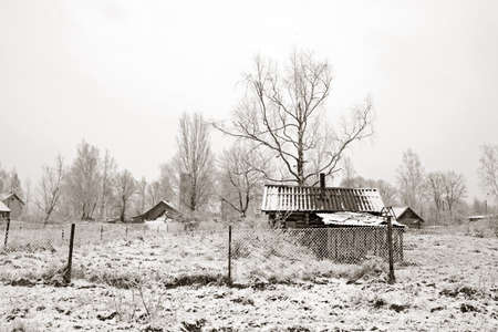 old rural house in snowの写真素材