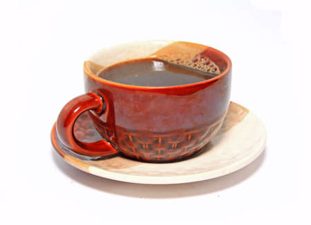 brown cup on white background