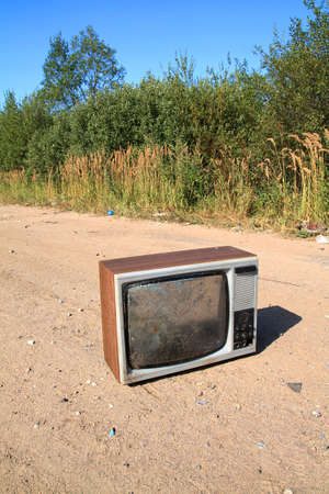 old television set on rural roadの写真素材
