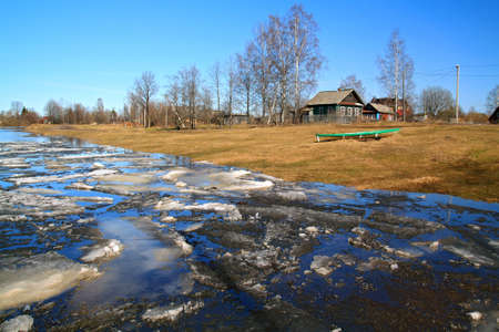 driving of ice on river to will to villagesの写真素材