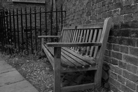 Monochrome of bench outside Hampstead Heath Parish Churchの写真素材