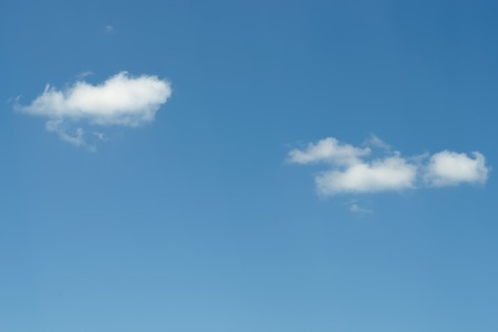 Blue Sky and puffy clouds. Background from clouds. Colorful in nature background