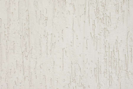 Light plaster wall. Abstract background with vertical stripes. Background for decoration. Copy spaceの写真素材