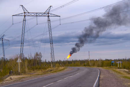 oil torch in West Siberia. Pollution of environmentの写真素材