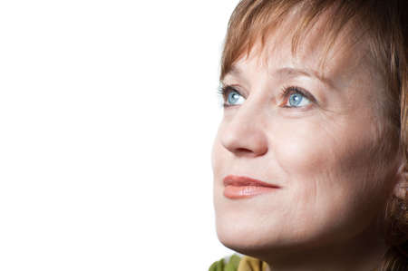 portrait of a blue-eyed woman isolated on a white backgroundの写真素材