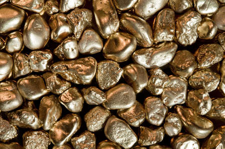shiny gold nuggets background. closeup.の写真素材