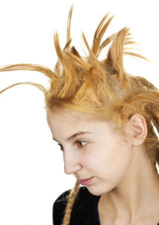 young girl with a strange hairdo on a white backgroundの写真素材