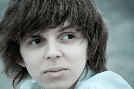 black and white portrait of a attractive teenager with shaggy hairの写真素材