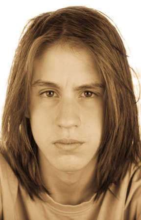 monochrome portrait of a attractive sad teenager with shaggy hair