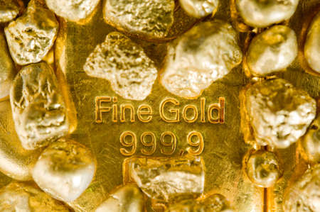 fine gold ingots and nuggets. の写真素材
