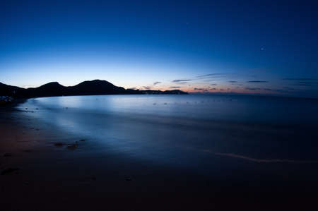 Night view of the sea bay の写真素材