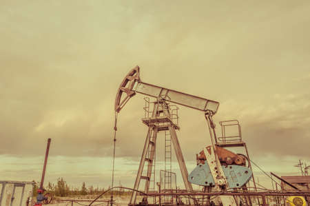 Pump jack. Extraction of oil. Petroleum concept.の写真素材