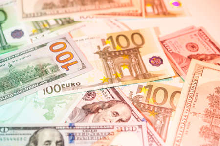 Dollars and euro bills background. Close up cash money.の写真素材