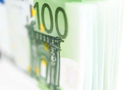 Euro money, Euro cash background. Banknotes of the european union on a white background. Shallow depth of field.の写真素材