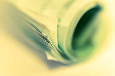 Euro money, Euro cash background. Banknotes of the european union on a white background. 100 euros roll.の写真素材