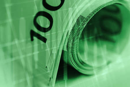 Double exposure Stock market display or forex trading graph and candlestick chart on Euro banknote.の写真素材