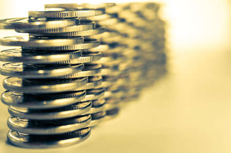 Stack of golden coins macro. Rows of coins for finance and banking concept. Economy trends...