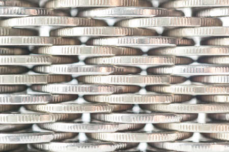 Stack of coins macro. Rows of coins for finance and banking concept. Economy trends background.の写真素材