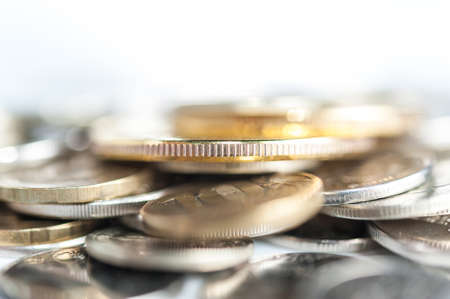 Stack of coins macro. Rows of coins for finance and banking concept. Economy trends background.の写真素材