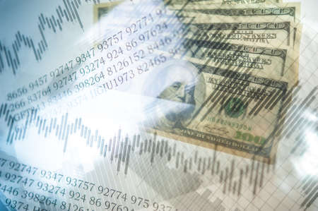 Double exposure Stock market display or forex trading graph and candlestick chart on dollar banknoteの写真素材