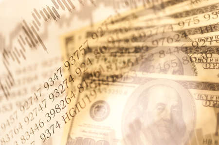 Double exposure Stock market display or forex trading graph and candlestick chart on dollar banknoteの写真素材