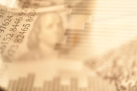 Double exposure Stock market display or forex trading graph and candlestick chart on dollar banknoteの写真素材