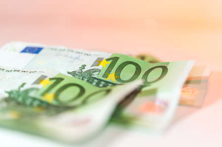 Euro cash background. Banknotes of the european union on a white background. Shallow depth of field.の写真素材