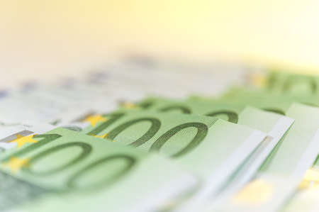 Euro cash background. Banknotes of the european union on a white background. Shallow depth of field.の写真素材