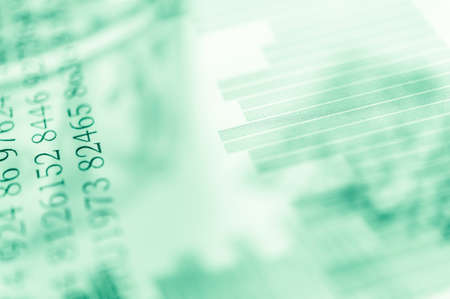 Double exposure Stock market display or forex trading graph and candlestick chart on dollar banknoteの写真素材