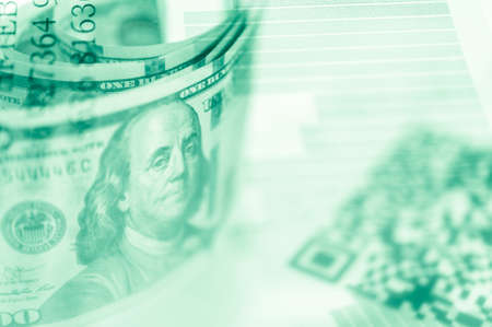Double exposure Stock market display or forex trading graph and candlestick chart on dollar banknote