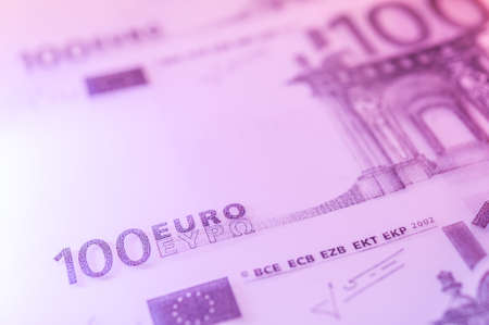 Closeup view of cash money euro bills background. Finance and business theme. Shallow depth of fieldの写真素材