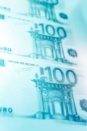 Closeup view of cash money euro bills background. Finance and business theme. Shallow depth of fieldの写真素材