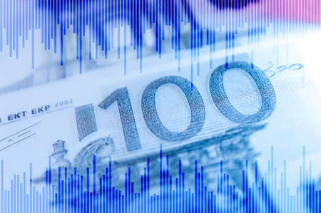Double exposure Stock market display or forex trading graph and candlestick chart on euro banknoteの写真素材