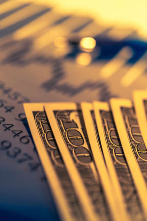 Finance background with money, stock market chart, graph and pen. Economy and business concept.の写真素材