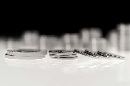 Stack of silver coins macro. Rows of coins for finance and banking concept. Trade in precious metals