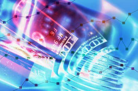 Stock market display or forex trading graph and candlestick chart on rows coins, banknote and gold.
