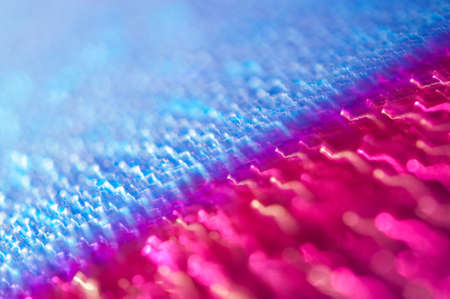 Drops on a shiny surface with a motion blur effect. Violet tonality in the style of the 80-90s.の写真素材