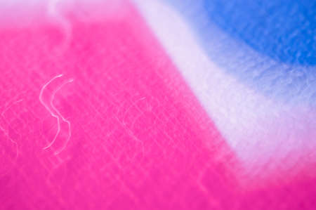 Drops on a shiny surface with a motion blur effect. Violet tonality in the style of the 80-90s.の写真素材
