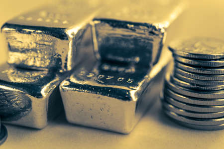 Gold bars and stack of gold coins. Background for finance banking concept. Trade in precious metals.の写真素材