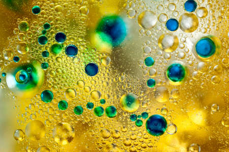 Colourful oil ink bubbles and drops. Abstract template mixed texture background. Wallpaper pattern.
