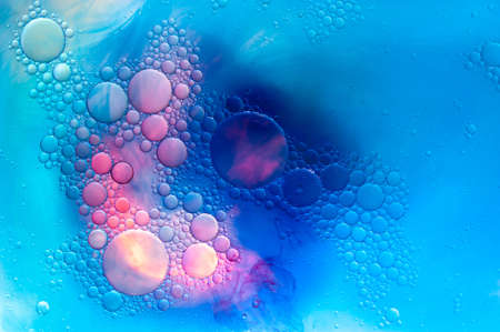 Colourful oil ink bubbles and drops. Abstract template mixed texture background. Wallpaper pattern.