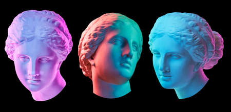 Statue of Venus de Milo. Creative concept colorful neon image with ancient greek sculpture Venus or Aphrodite head. Webpunk, vaporwave and surreal art style. Isolated on a black.の写真素材