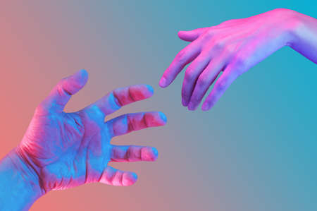 Two hand in a pop art collage style in neon bold colors. Modern psychedelic creative element with human palm for posters, banners, wallpaper. Copy space for text. Magazine style design. Zine culture.の写真素材