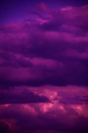 Natural sky composition. Dark ominous colorful storm rain clouds. Dramatic sky. Overcast stormy cloudscape. Thunderstorm. Element of apocalypse design. Toned.の写真素材