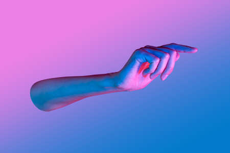 Hand in a pop art collage style in neon bold colors. Modern psychedelic creative element with human palm for posters, banners, wallpaper. Copy space for text. Magazine style design. Zine culture.の写真素材
