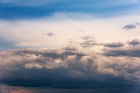 Natural sky composition. Dark ominous colorful storm rain clouds. Dramatic sky. Overcast stormy...