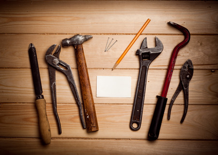 Desk of a carpenter with some toolsの写真素材