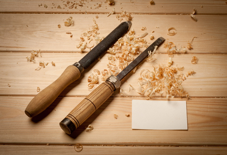 joinery tools on wood table background with business card and copy spaceの写真素材